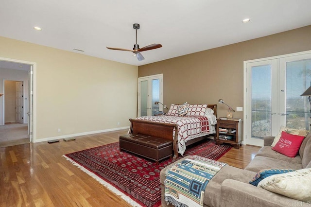 bedroom with access to exterior, french doors, light hardwood / wood-style flooring, and ceiling fan