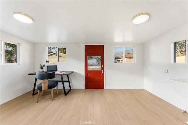 home office with light wood-type flooring