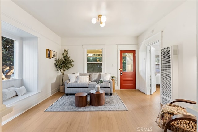 living room with light hardwood / wood-style floors