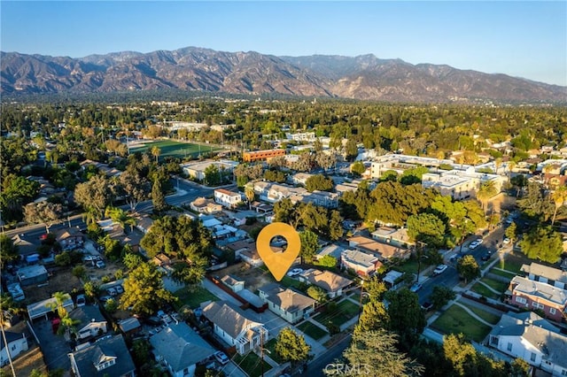 drone / aerial view featuring a mountain view