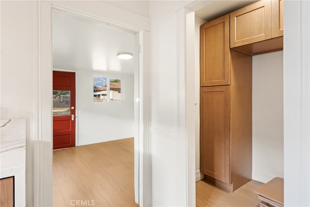 corridor featuring light hardwood / wood-style flooring