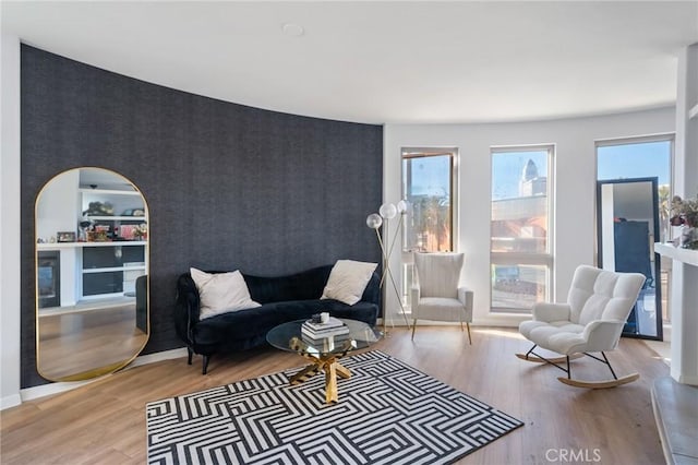 living area with light hardwood / wood-style flooring