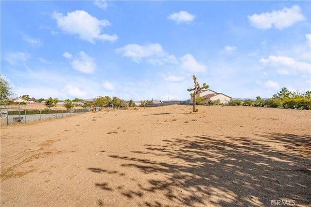 view of yard with a rural view