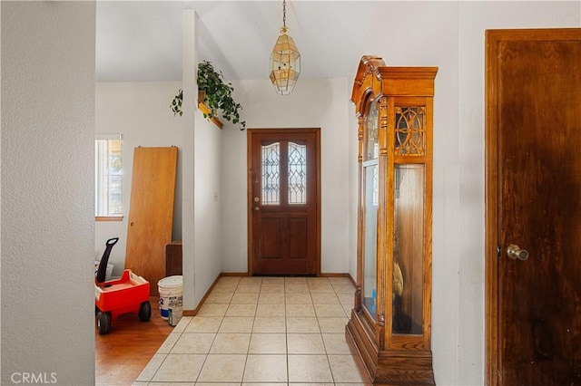 entrance foyer with light tile patterned floors