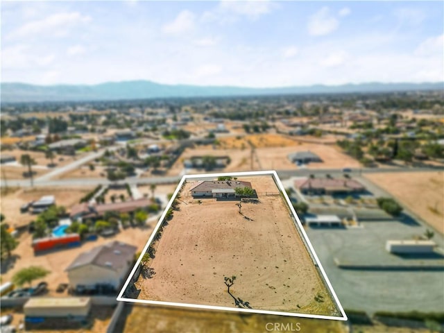 drone / aerial view with a mountain view