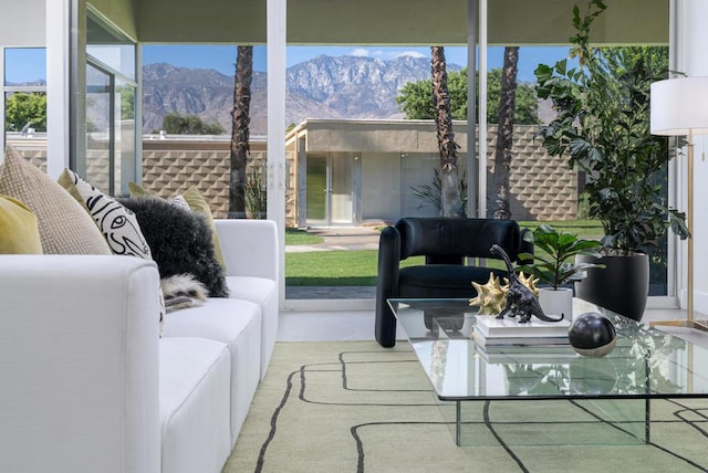 sunroom / solarium with a mountain view