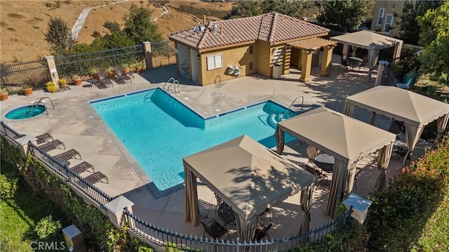 view of swimming pool with a gazebo, a pergola, and a patio