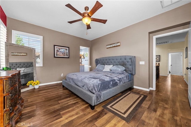 bedroom featuring dark wood-type flooring and ceiling fan