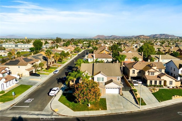 bird's eye view featuring a residential view and a mountain view