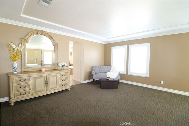 unfurnished room with crown molding, dark carpet, visible vents, and baseboards