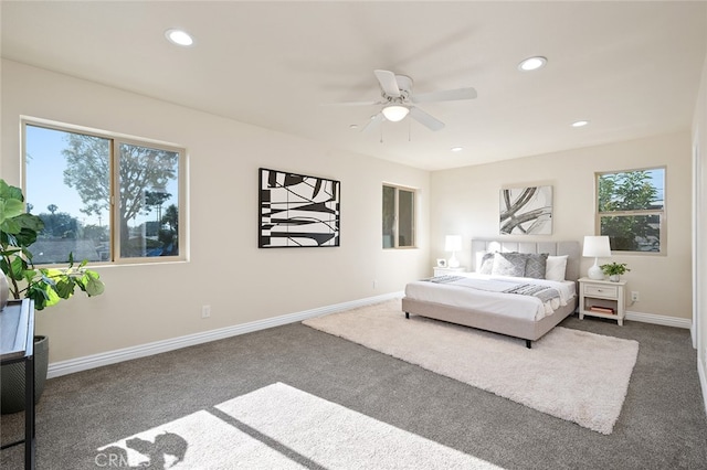 carpeted bedroom with ceiling fan