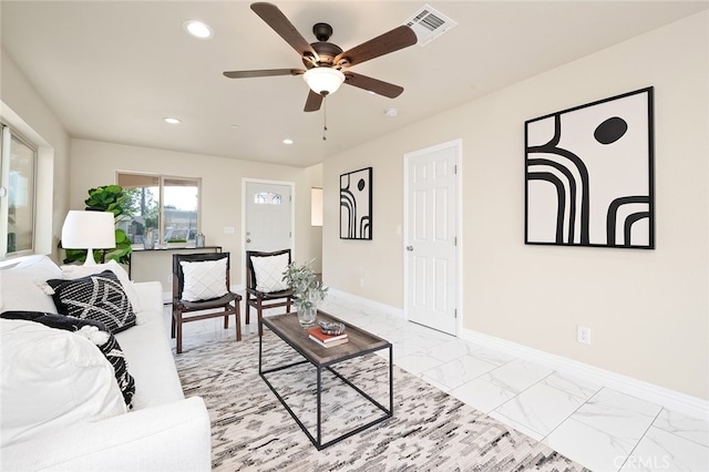 living room featuring ceiling fan