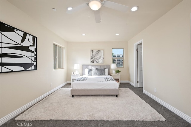 carpeted bedroom featuring ceiling fan