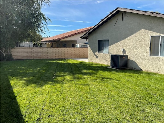 13165 Caspian Dr, Victorville, CA 92395 - exterior space with fence and central AC unit