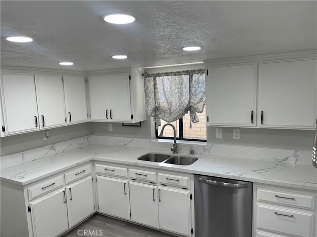 13165 Caspian Dr, Victorville, CA 92395 - kitchen featuring white cabinets, recessed lighting, dishwasher, a sink, and light stone countertops