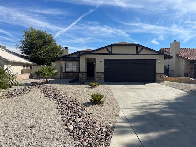 13165 Caspian Dr, Victorville, CA 92395 - ranch-style home with a chimney, driveway, stone siding, an attached garage, and stucco siding