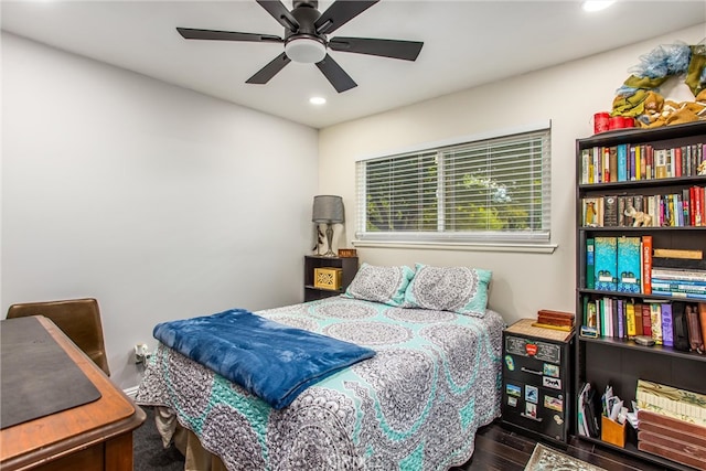 bedroom featuring dark hardwood / wood-style flooring and ceiling fan