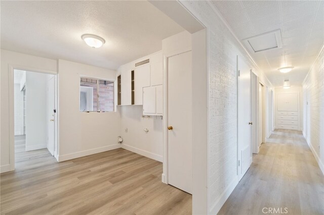 hallway featuring light hardwood / wood-style flooring