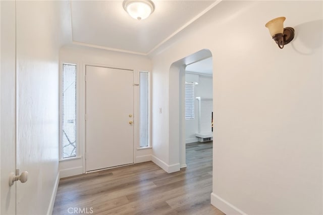 foyer entrance featuring light wood-type flooring