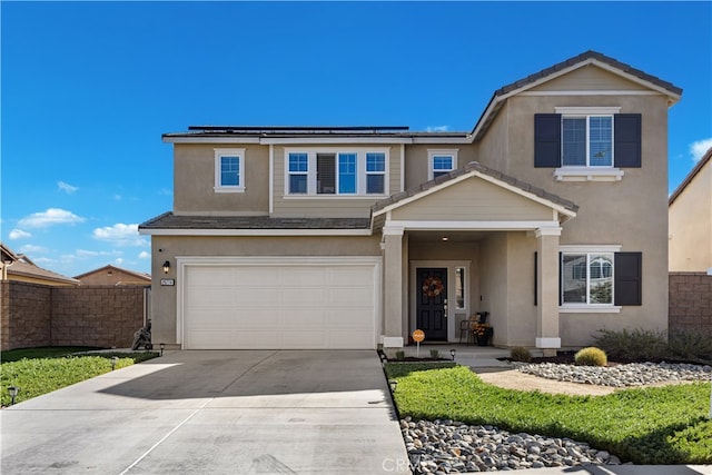 view of front of property with a garage