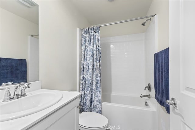 full bathroom with vanity, toilet, and shower / bath combination with curtain