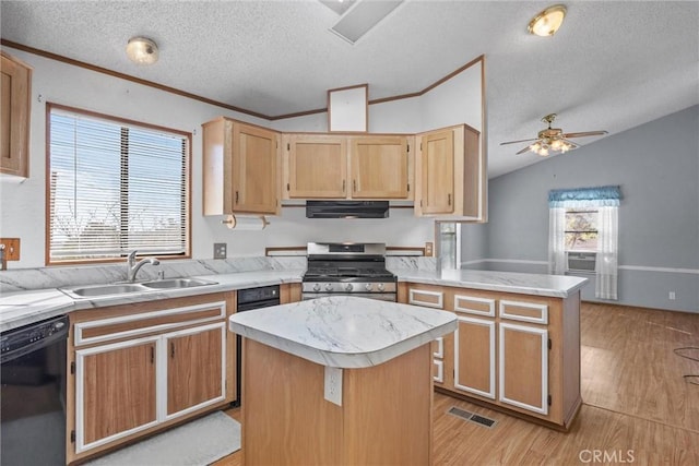 kitchen with light countertops, stainless steel gas stove, a kitchen island, a sink, and dishwasher