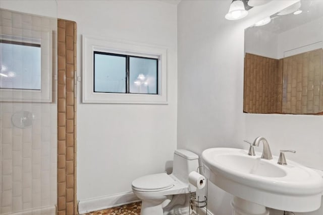 bathroom with toilet and sink