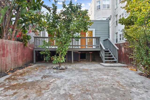 rear view of property with a deck