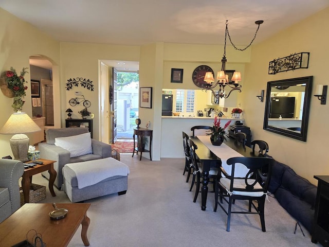 living room featuring a notable chandelier