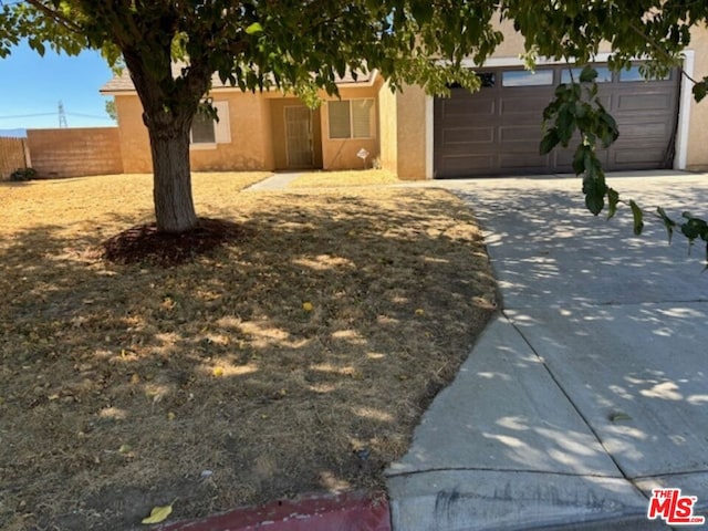 view of yard with a garage