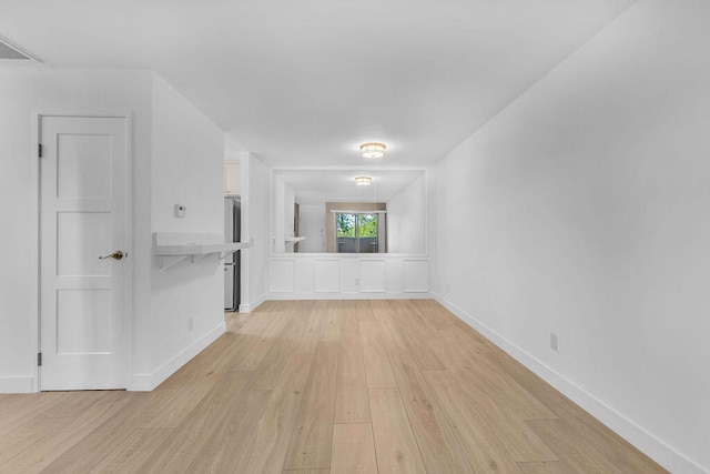 empty room featuring light hardwood / wood-style floors