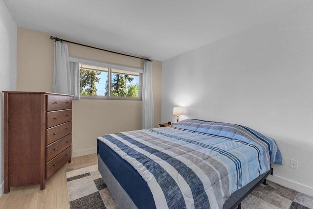 bedroom featuring light hardwood / wood-style floors