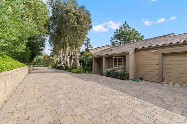 view of patio with a garage