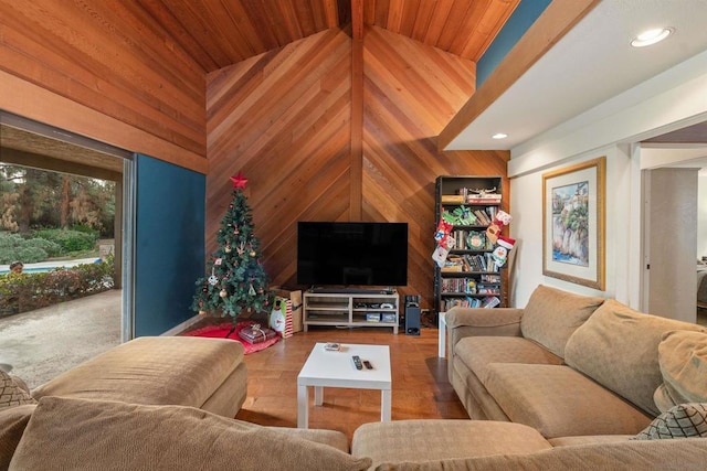 living room with hardwood / wood-style floors, vaulted ceiling with beams, wooden walls, and wooden ceiling