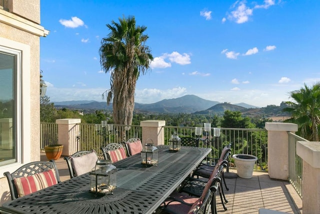 wooden deck featuring a mountain view