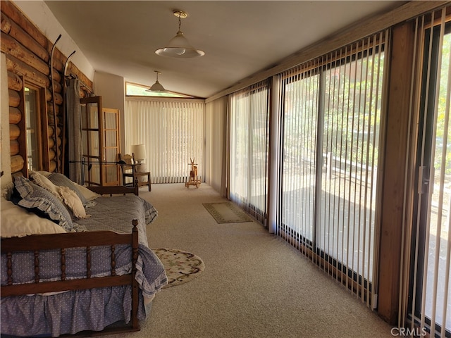 bedroom featuring access to outside and carpet floors