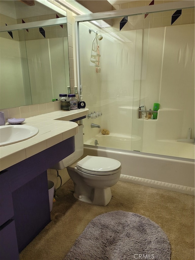 full bathroom featuring vanity, toilet, and enclosed tub / shower combo