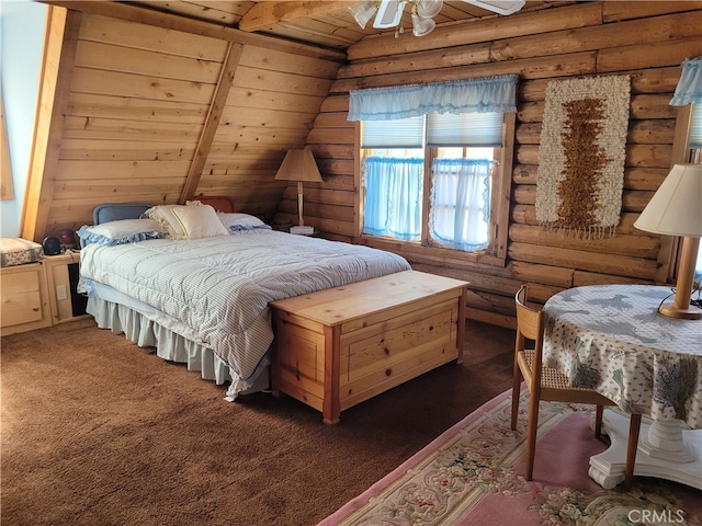 bedroom with dark colored carpet, vaulted ceiling with beams, wooden ceiling, log walls, and ceiling fan