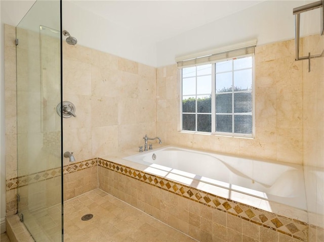 bathroom with independent shower and bath