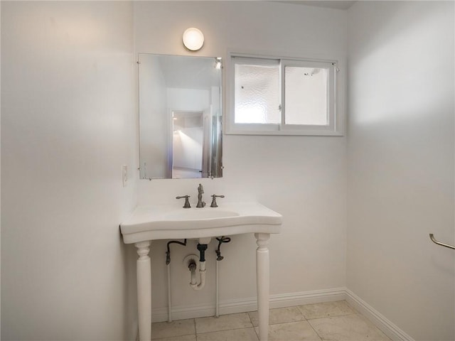 bathroom featuring tile patterned floors and sink