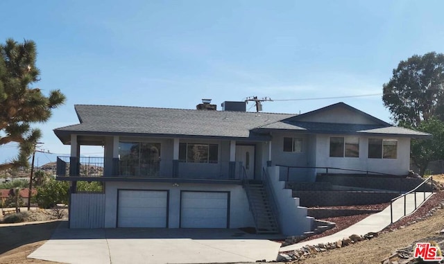 view of front of property featuring a garage