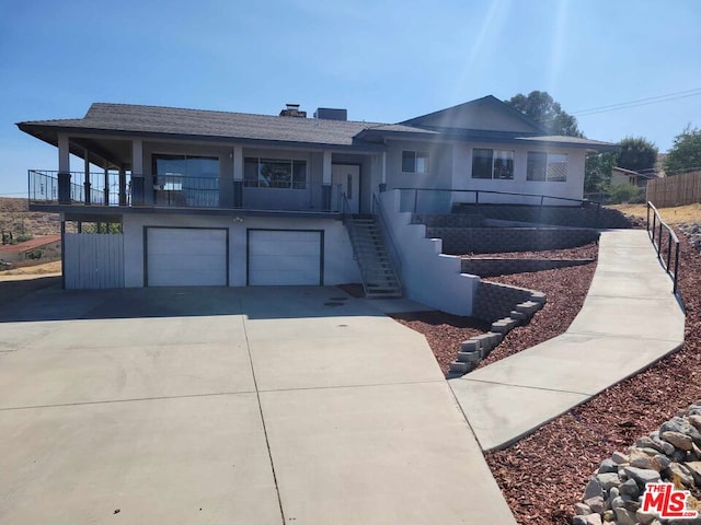 view of front of home with a garage