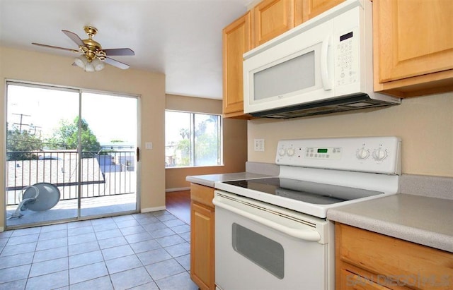 kitchen featuring ceiling fan, light brown cabinets, white appliances, and light tile patterned floors