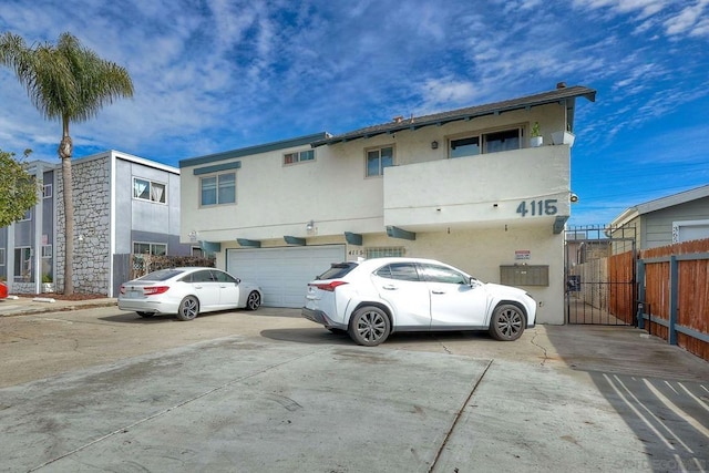 view of front of property with a garage