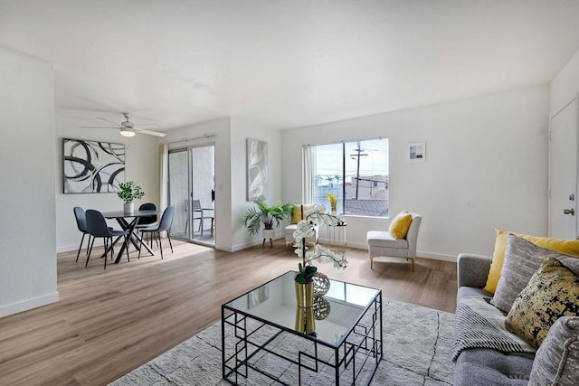 living room with light hardwood / wood-style flooring