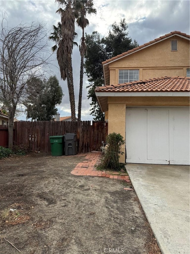 exterior space with a garage