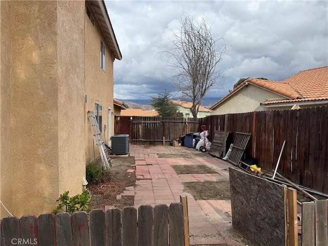 view of patio / terrace featuring cooling unit