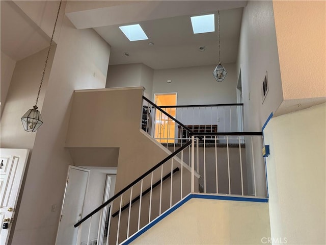 stairway with a high ceiling