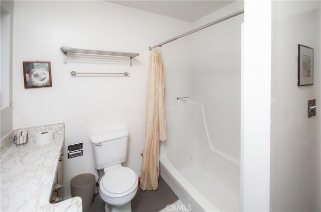 bathroom with shower / bathtub combination with curtain and toilet