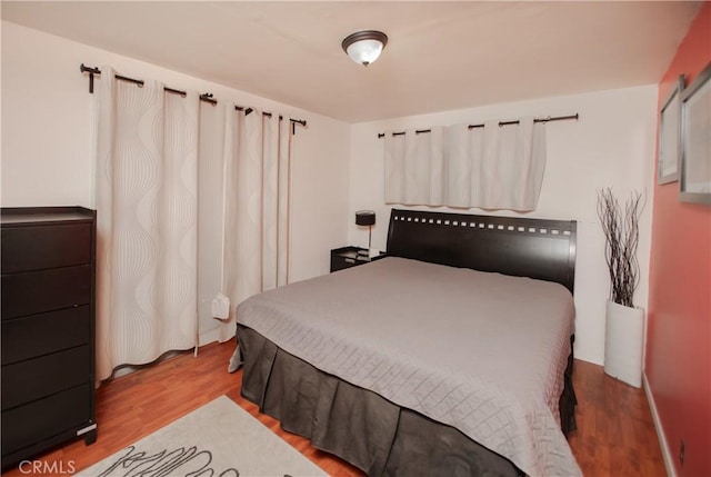 bedroom featuring light hardwood / wood-style flooring